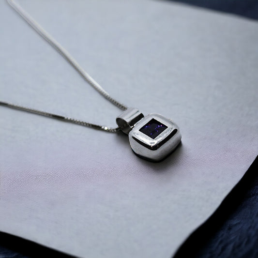 Whitegold with violette stone