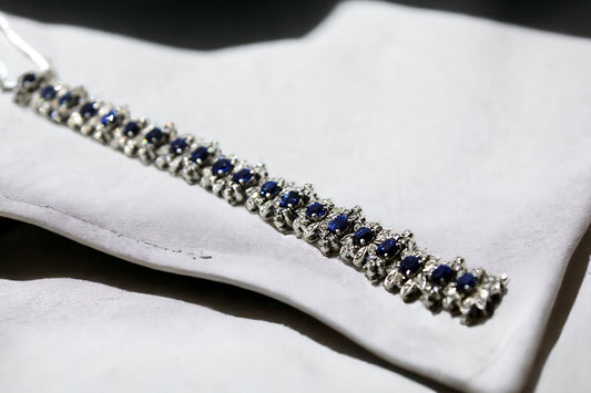 Whitegold bracelet with diamonds and saphires