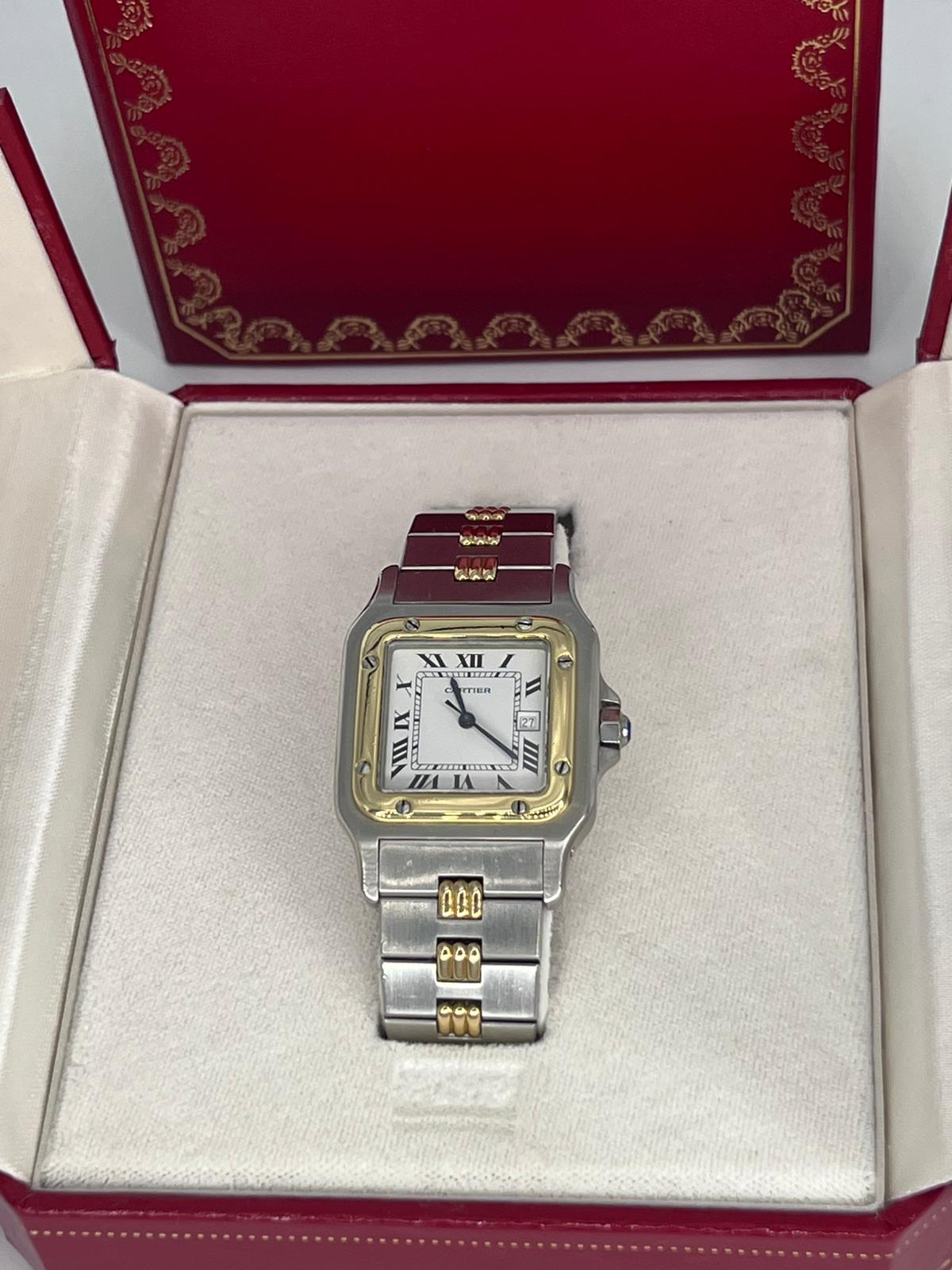 Reloj de oro y acero, Marca: CARTIER, Modelo: SANTOS GALBE con su caja y papeles.