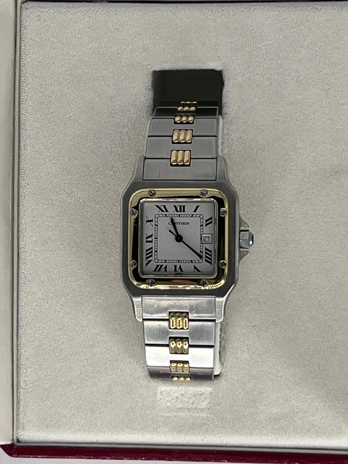 Reloj de oro y acero, Marca: CARTIER, Modelo: SANTOS GALBE con su caja y papeles.