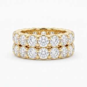 A&ntilde;illo de oro blanco y amarillo de 18k con 2 l&iacute;neas de diamantes con un total de -/+ 1.45Cts en total, peso: 13,38gr, Talla: 55.