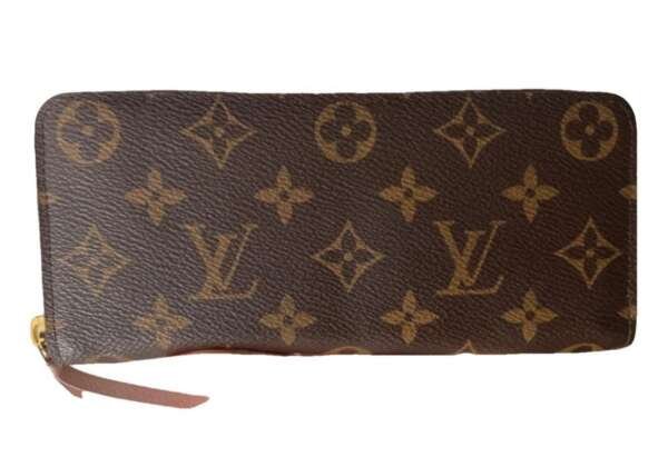 Cartera Louis Vuitton Clemence Monograma cuero marrón interior rosa