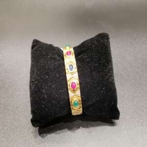 Pulsera de oro 18 k con esmeraldas, rubís y zafiros