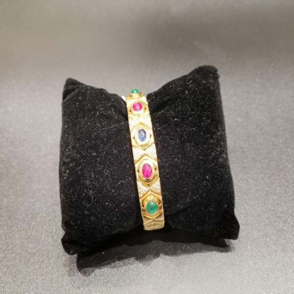 Pulsera de oro 18 k con esmeraldas, rubís y zafiros