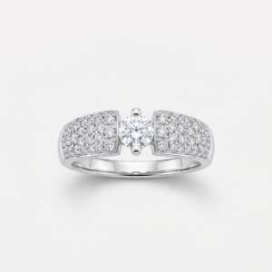 Anillo oro 14 k con diamante central 0.30 cts y laterales