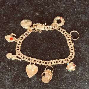 Pulsera breloque de oro 18k peso 19,85gr