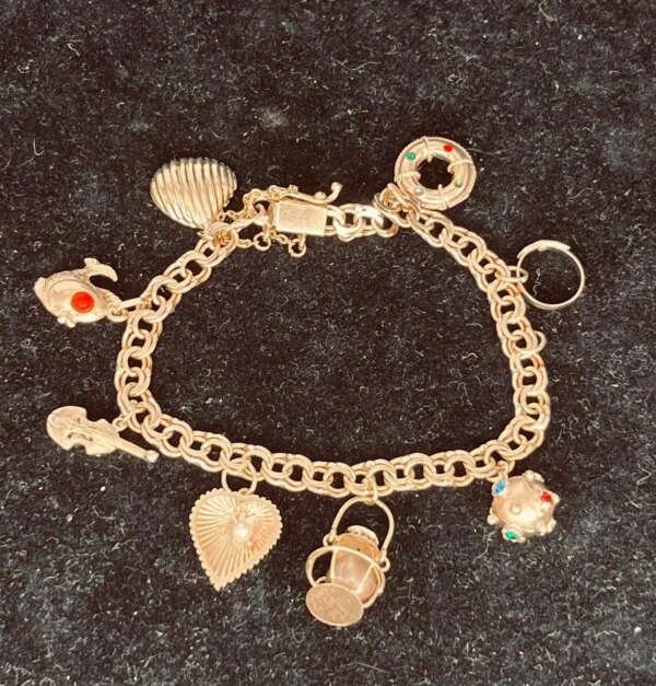 Pulsera breloque de oro 18k peso 19,85gr