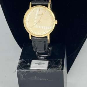 Reloj Patek Philippe de oro 18k con correa de cuero