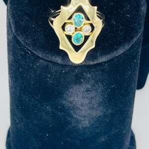 Añillo de oro 18k con 2 esmeraldas y 2 diamantes talla 57