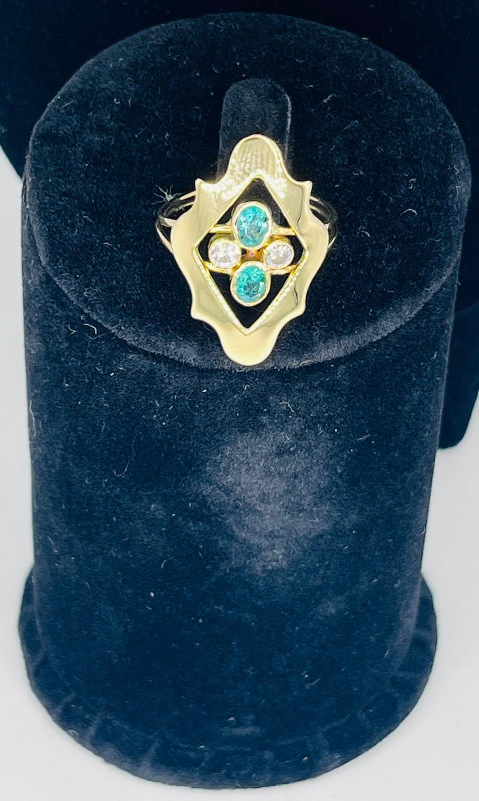 Añillo de oro 18k con 2 esmeraldas y 2 diamantes talla 57