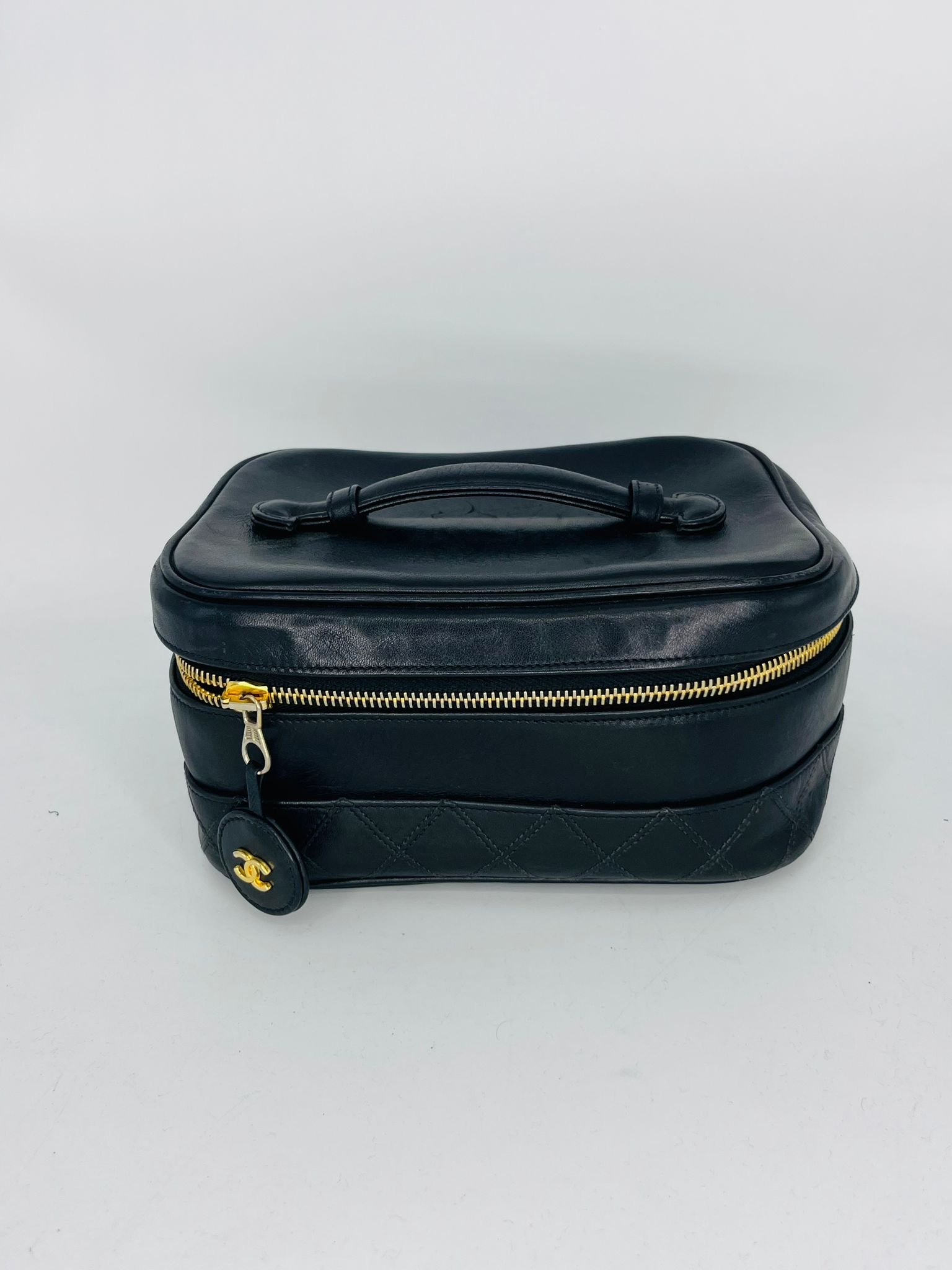 Neceser Chanel vintage de cuero negro año 1991-1994