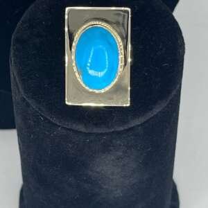 Añillo de oro de 9k con piedra turquesa