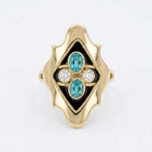 Anillo de oro de 18k con 2 esmeraldas y 2 diamantes