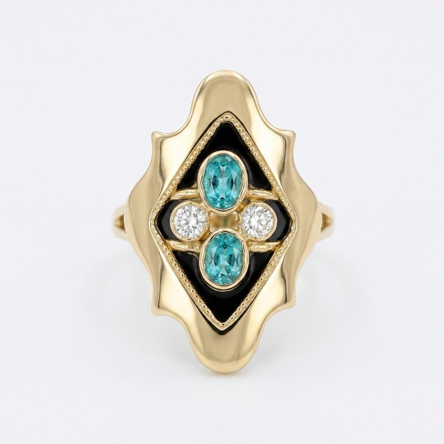 Anillo de oro de 18k con 2 esmeraldas y 2 diamantes