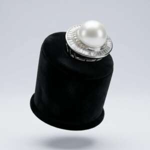 Anillo oro 18k diamantes baguette perla