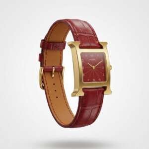 Hermès Heure H acero chapado oro esfera roja correa roja