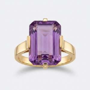 Anillo oro 18k piedra violeta